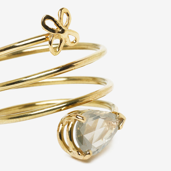Anello a spirale con piccolo fiore 